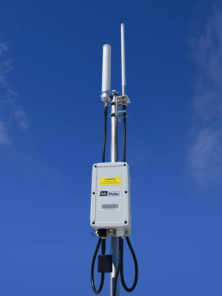 AirDetect Pro on a mast: two rod antennas above the sensor enclosure